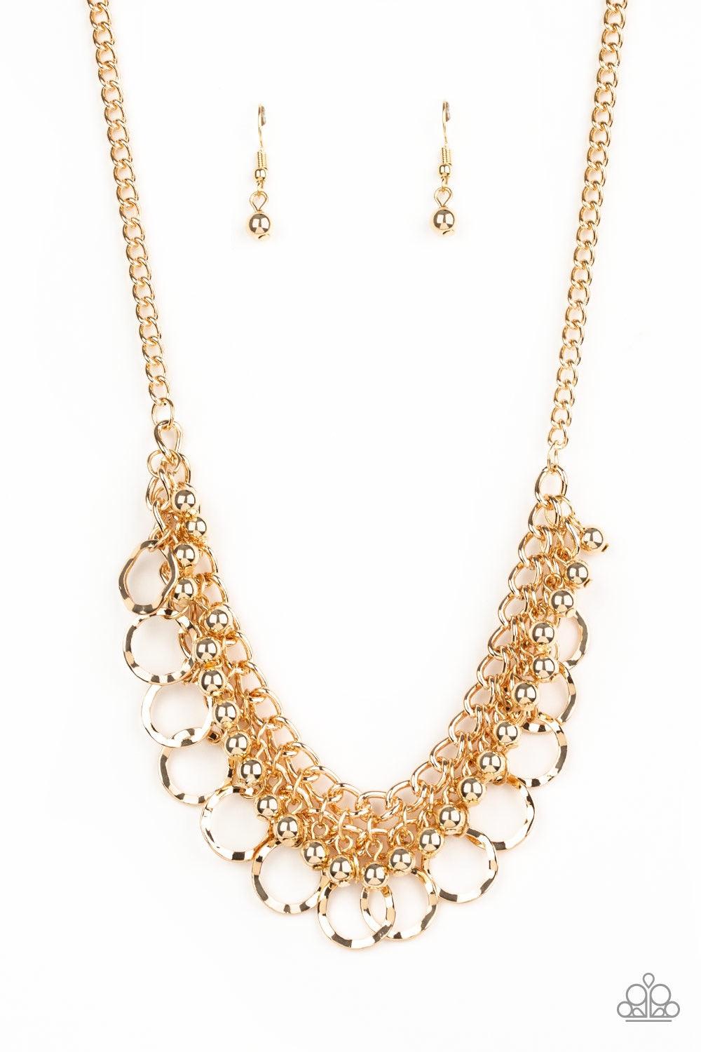 Paparazzi Accessories Ring Leader Radiance - Gold Rows of shiny gold beads and hammered gold rings swing from the bottom of interlocking gold chains, creating a bold fringe below the collar. Features an adjustable clasp closure. Jewelry