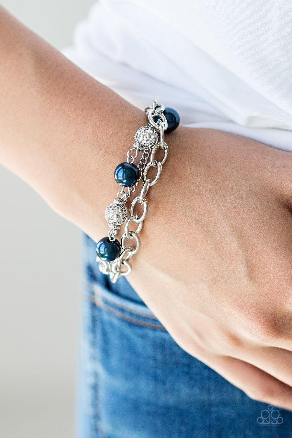 Paparazzi Accessories Vintage Variety ~Blue Wrapped in wire mesh, classic silver beads join pearly blue beads along a shimmery silver chain. Varying in size and shimmer, mismatched silver chains join the beaded strand around the wrist for a refined finish