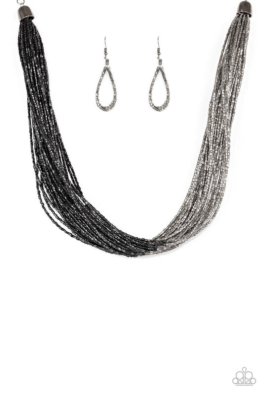 Paparazzi Accessories Flashy Fashion - Black Brushed in a flashy finish, countless strands of black seed beads converge with strands of gunmetal seed beads, creating colorful layers below the collar. Features an adjustable clasp closure. Sold as one indiv