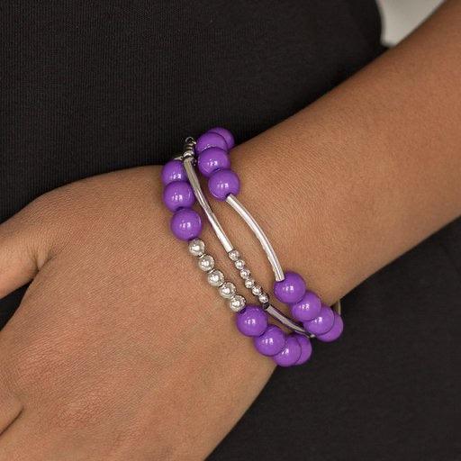 Paparazzi Accessories New Adventures - Purple Polished purple beads and mismatched silver beads are threaded along stretchy bands, creating colorful layers across the wrist. Jewelry