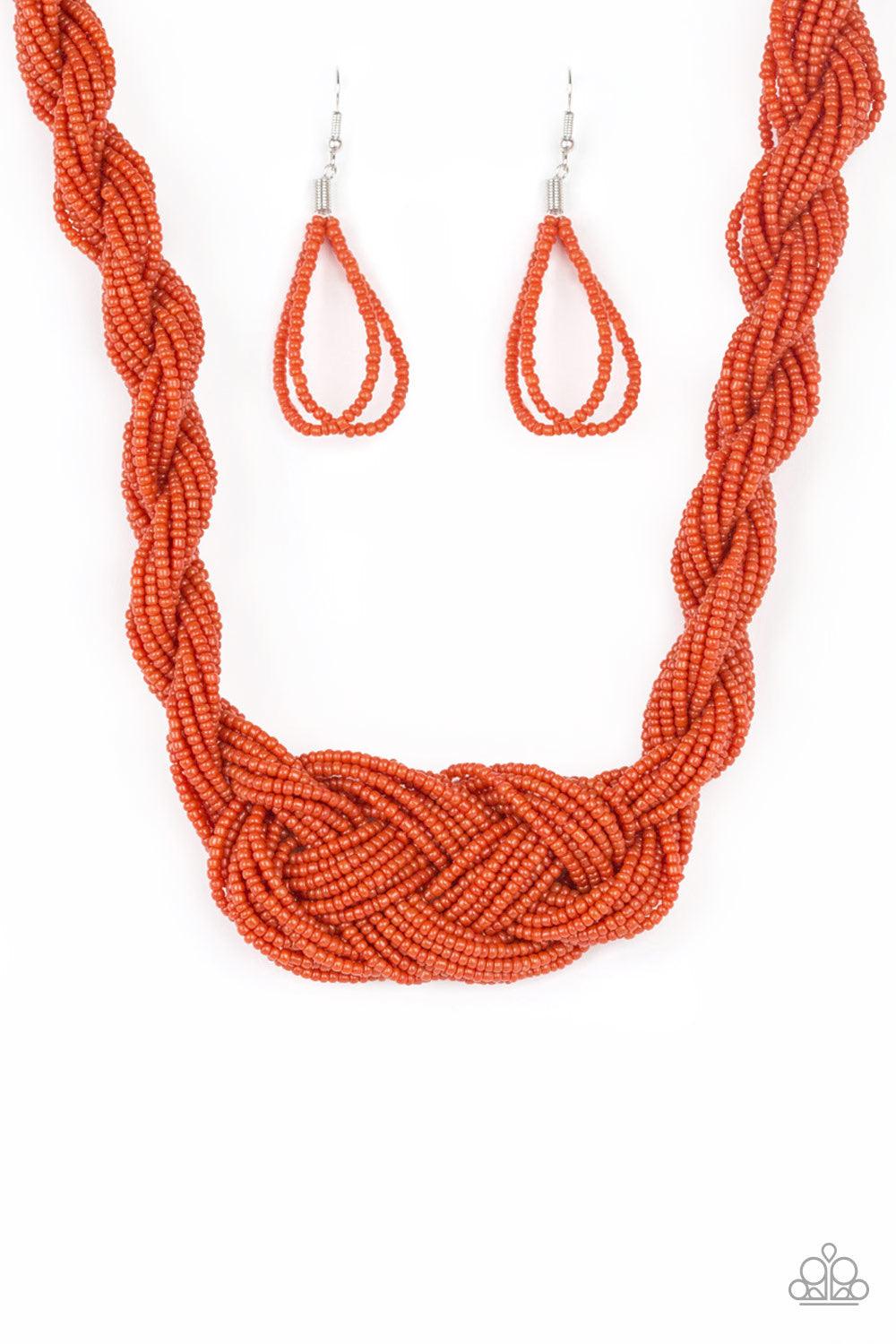 Paparazzi Accessories A Standing Ovation - Orange Countless strands of burnt orange seed beads are twisted and knotted together to create an unforgettable statement piece. Features an adjustable clasp closure. Jewelry