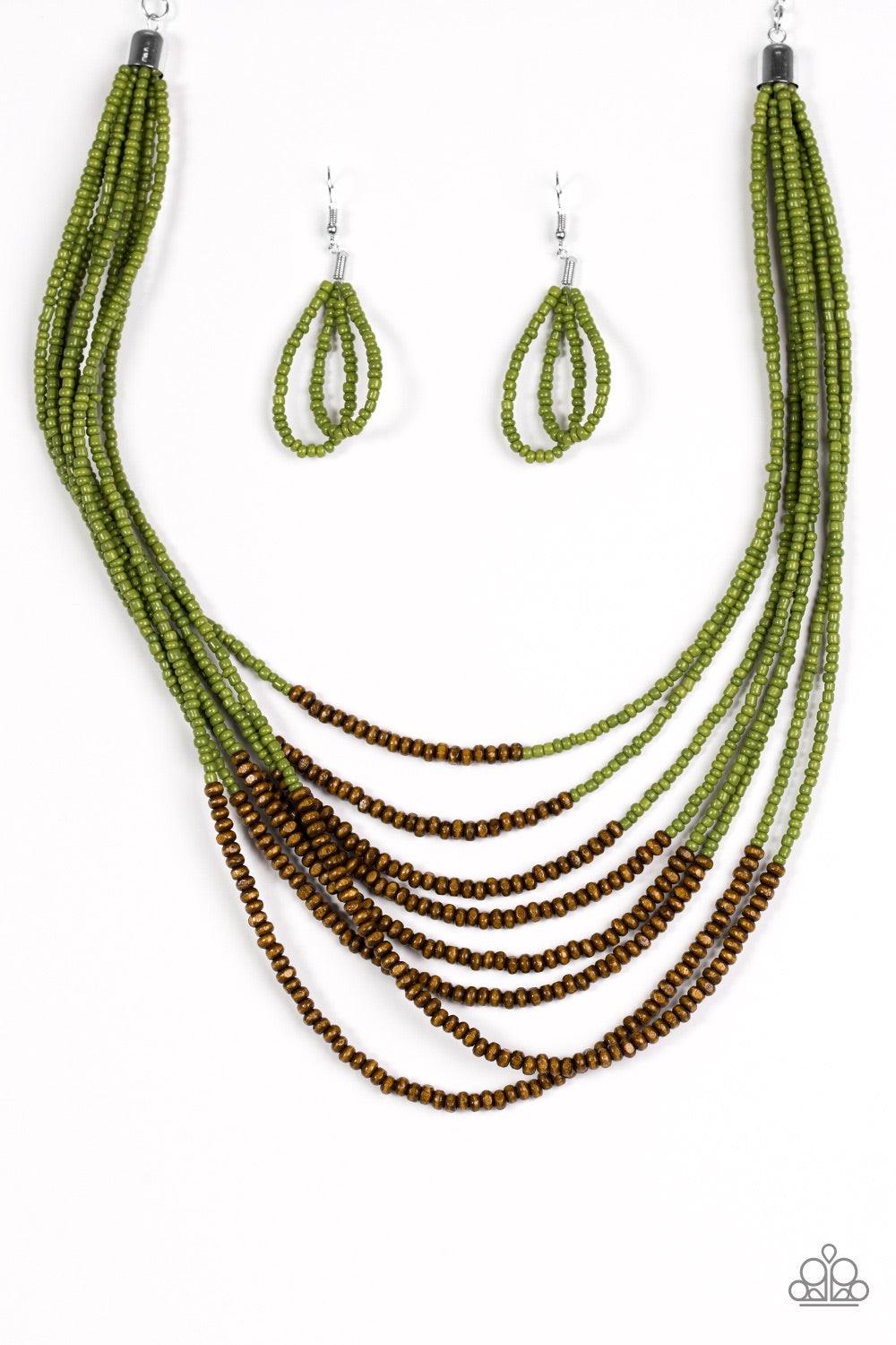 Paparazzi Accessories The Savannah Plains - Green Countless green seed beads fall into a tiered display. Dainty wooden beads adorn the center of the colorful strands, adding an earthy twist to the beautiful design. Features an adjustable clasp closure. Je