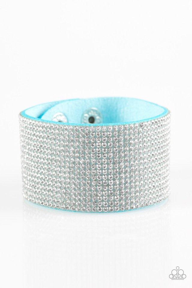 Paparazzi Accessories Roll With The Punches - Blue Row after row of glassy white rhinestones are encrusted along a thick blue suede band, creating knockout shimmer across the wrist. Features an adjustable snap closure. Bracelets