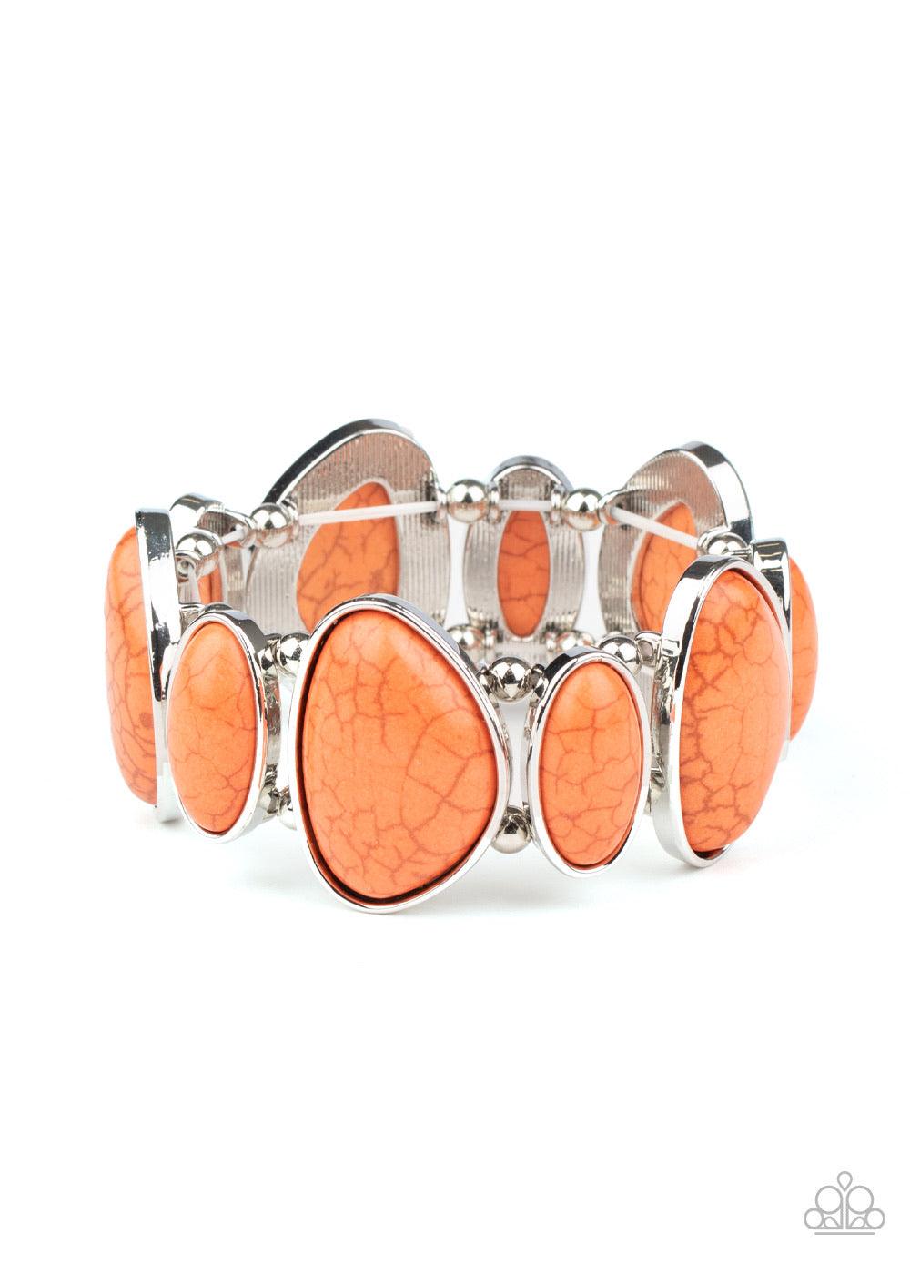 Paparazzi Accessories Feel At Homestead - Orange Featuring imperfect shapes, refreshing orange stones are pressed into asymmetrical silver frames that are threaded along stretchy bands that wrap around the wrist for an earthy look. Sold as one individual