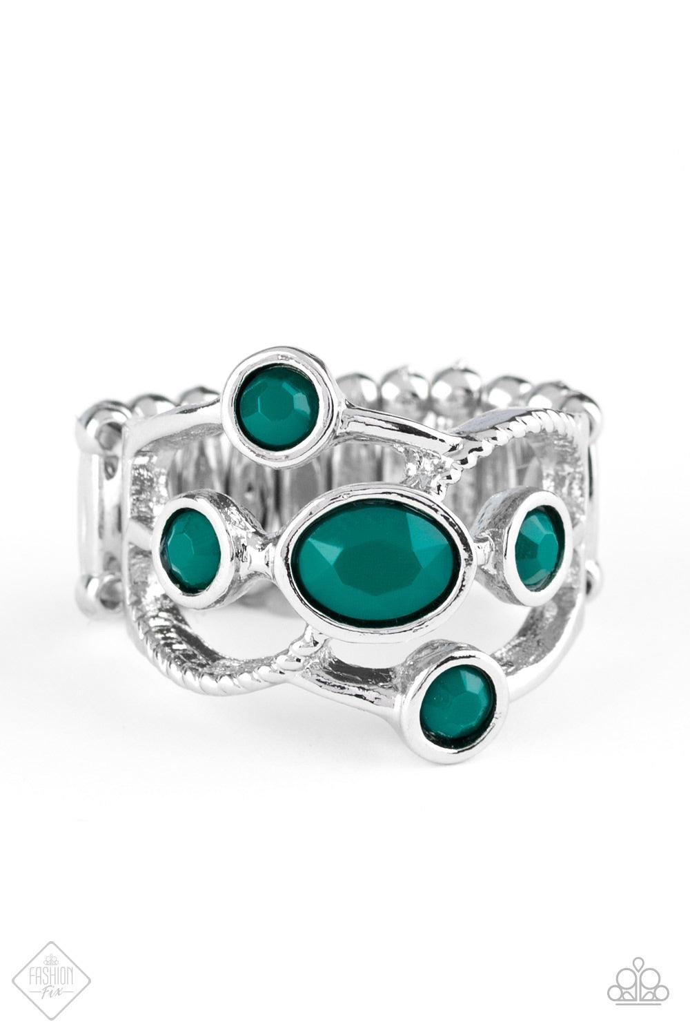 Paparazzi Accessories Carnival Catwalk - Green Featuring smooth and serrated surfaces, shimmery silver bars crisscross across the finger, coalescing into an airy band. Faceted Quetzal Green beads are sprinkled across the bands for a colorful finish. Featu