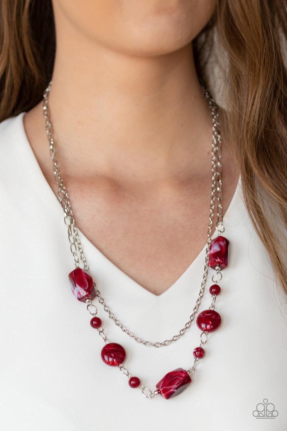 Paparazzi Accessories Colorfully Cosmopolitan - Red Infused with a plain silver chain, a collection of round and faceted red acrylic beads link below the collar for a whimsically colorful finish. Features an adjustable clasp closure. Jewelry