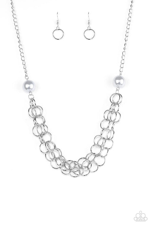 Paparazzi Accessories Daring Diva - Silver Two oversized silver pearls give way to dramatic silver chains, creating bold layers below the collar for a sassy look. Features an adjustable clasp closure. Sold as one individual necklace. Includes one pair of