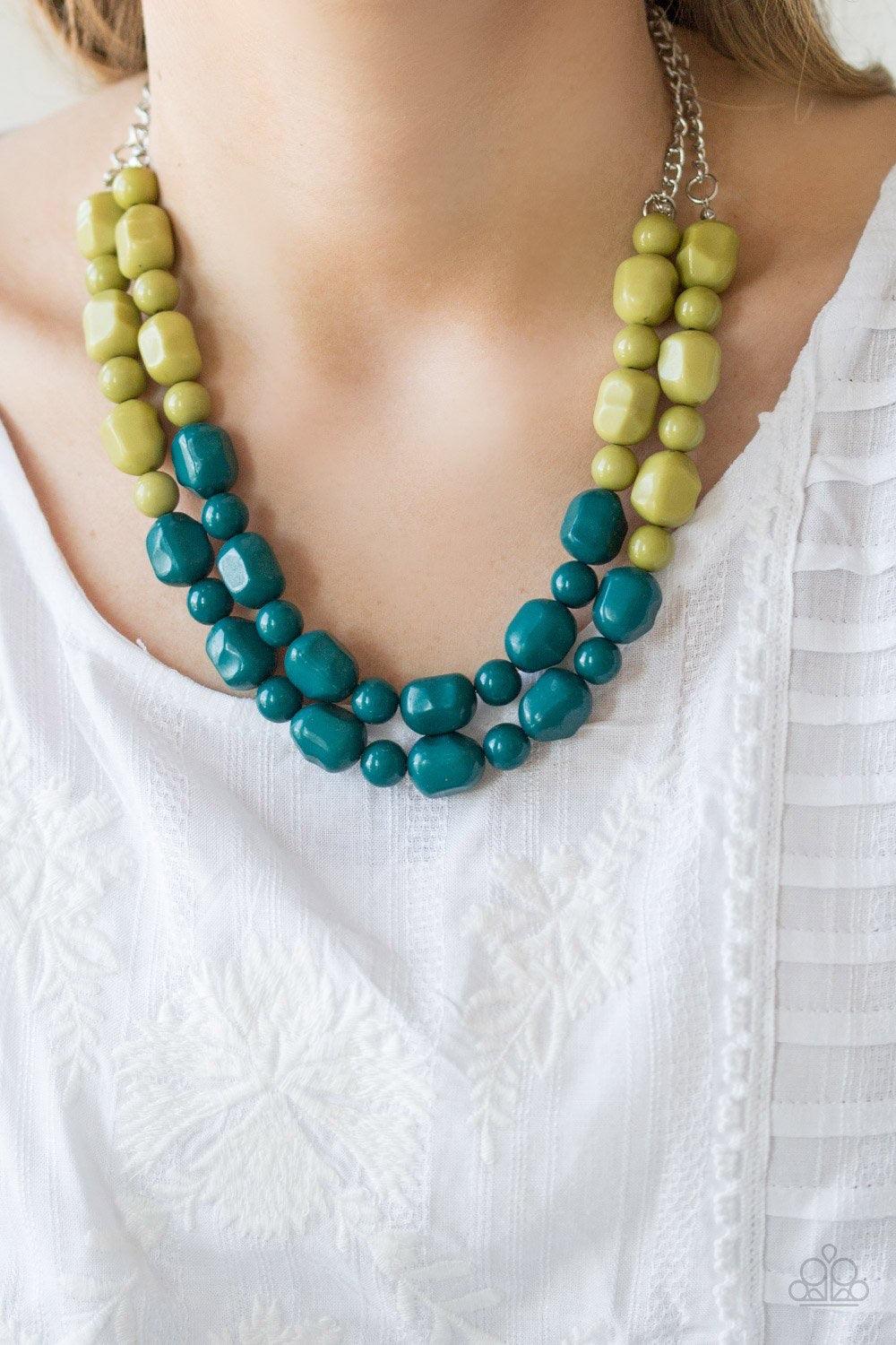 Paparazzi Accessories Island Excursion - Green 2 Tiers of round and abstract green beading give way to blue beading, creating a cascading complementary ombre-effect below the collar. Features an adjustable clasp closure. Jewelry