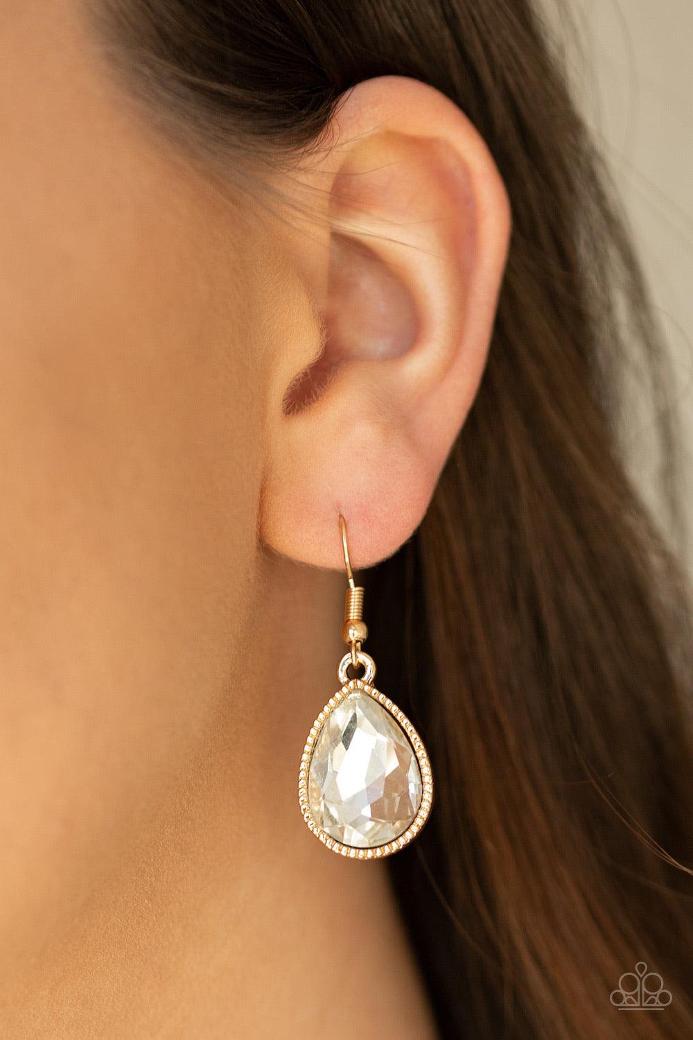 Paparazzi Accessories All Toget-HEIR Now - Gold Teardrop rhinestones swing from the bottom of a bold gold chain, creating a dramatic fringe below the collar. A strand of glittery white rhinestones attach to the top of a shimmery gold chain, adding a refin