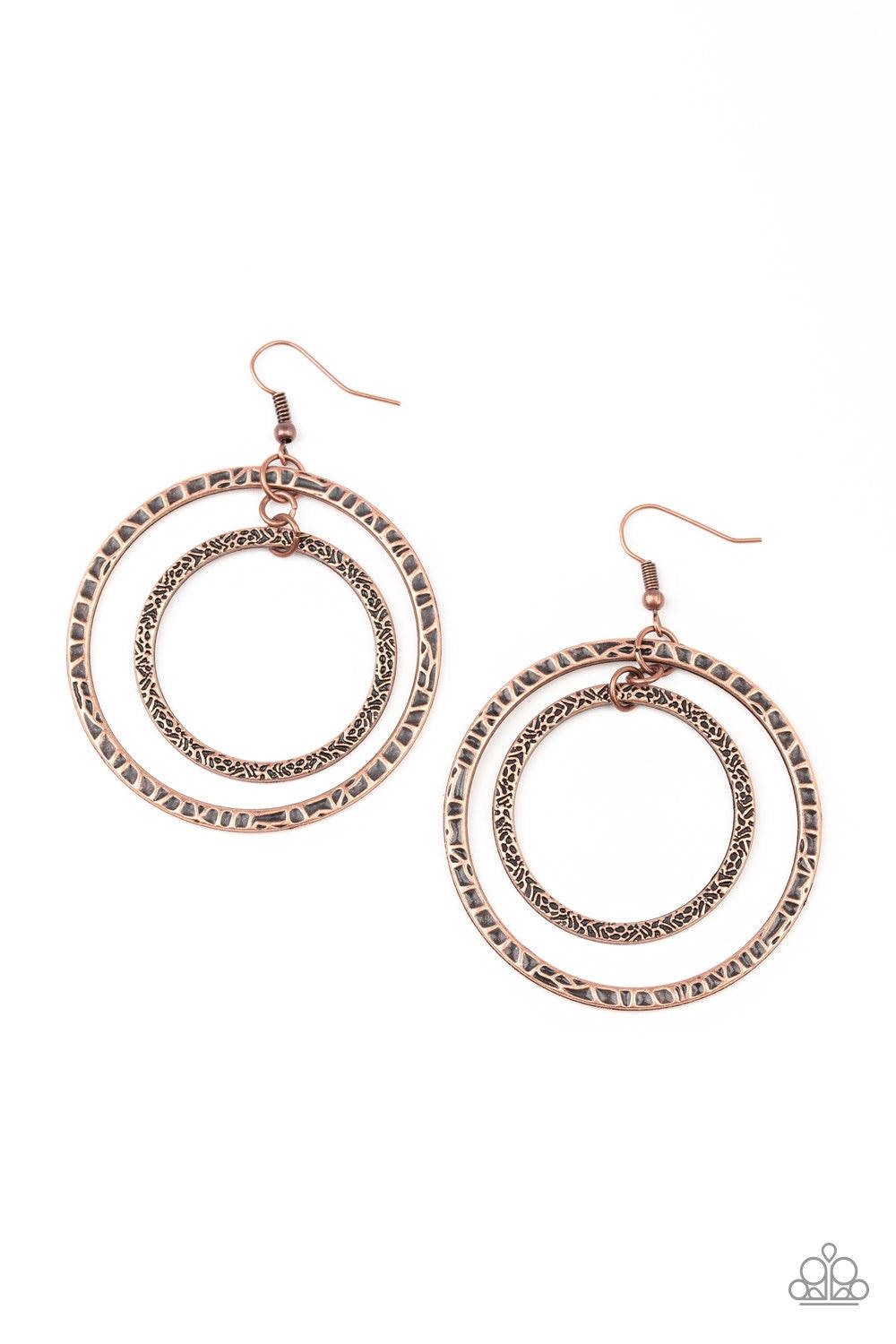 Paparazzi Accessories Fiercely Focused - Copper Mismatched copper hoops swing from the ear, creating a collision of metallic texture. Earring attaches to a standard fishhook fitting. Jewelry