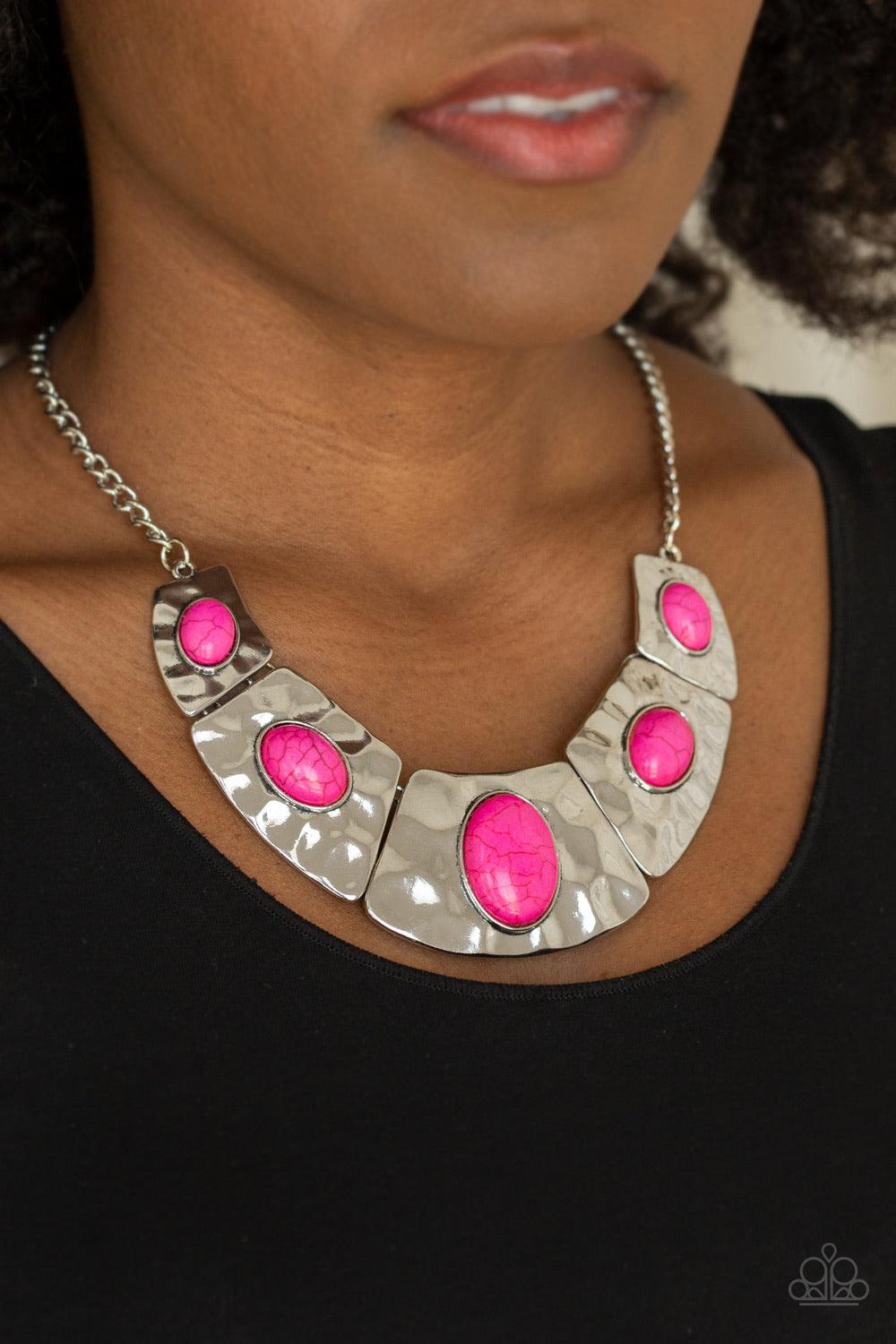 Paparazzi Accessories RULER In Favor - Pink Dotted with vivacious pink stone accents, a collection of hammered silver plates link below the collar for an artisan inspired look. Features an adjustable clasp closure. Jewelry