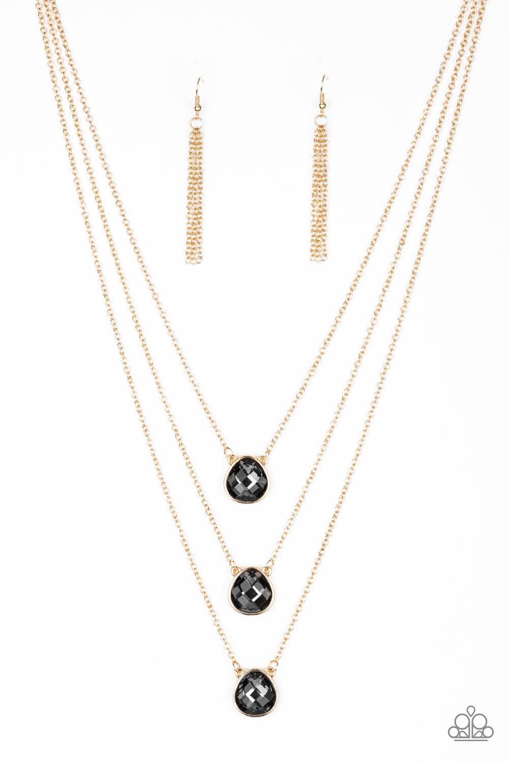Paparazzi Accessories Once in a MILLIONAIRE - Multi Featuring sleek gold frames, imperfect teardrop gems layer down the chest in a refined fashion. Features an adjustable clasp closure. Sold as one individual necklace. Includes one pair of matching earrin