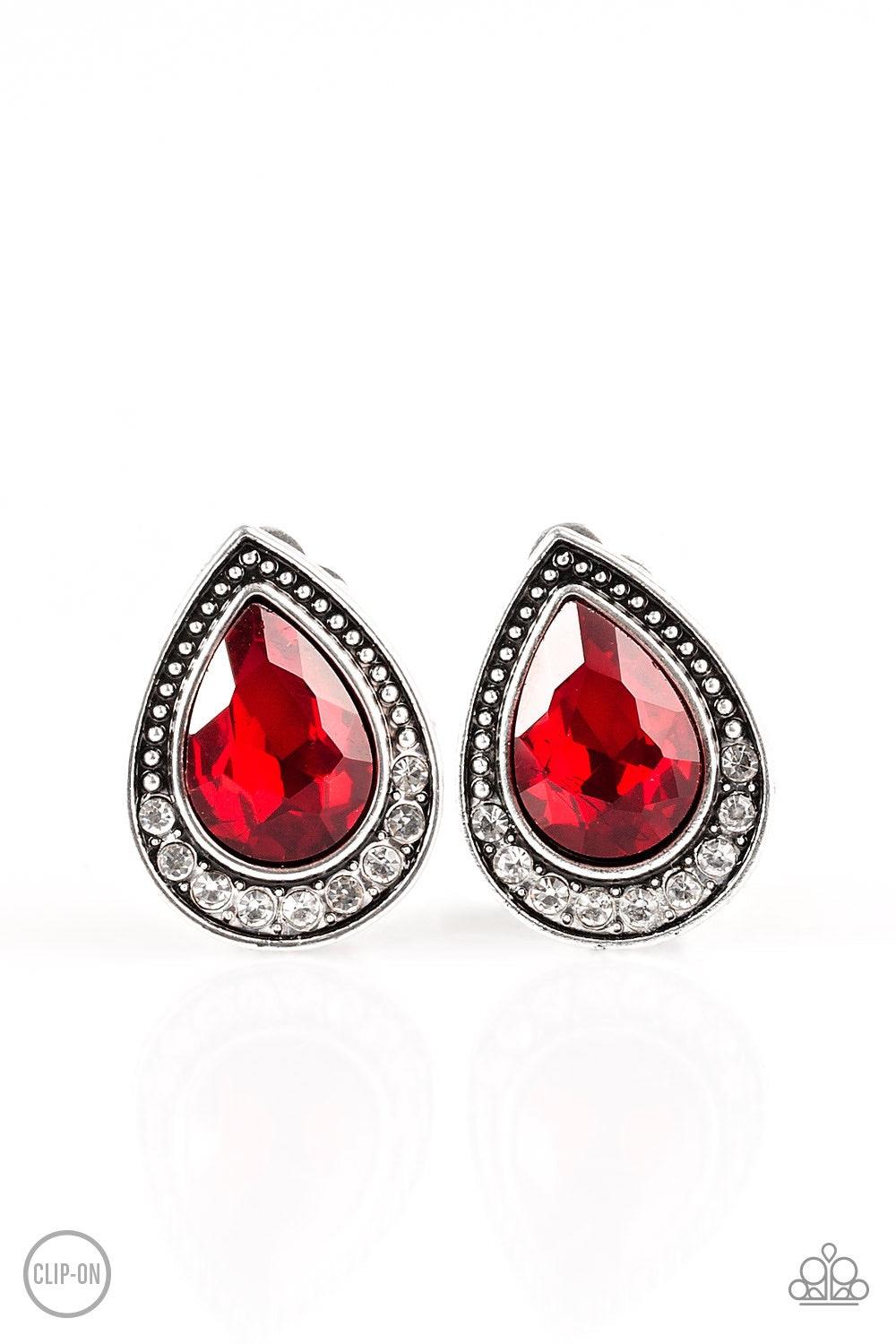 Paparazzi Accessories Radiantly Ravishingly - Red *Clip-On A fiery red gem is pressed into an ornate silver teardrop. Infused with dainty silver studs, the bottom of the frame is encrusted in glittery white rhinestones for a classic finish. Earring attach