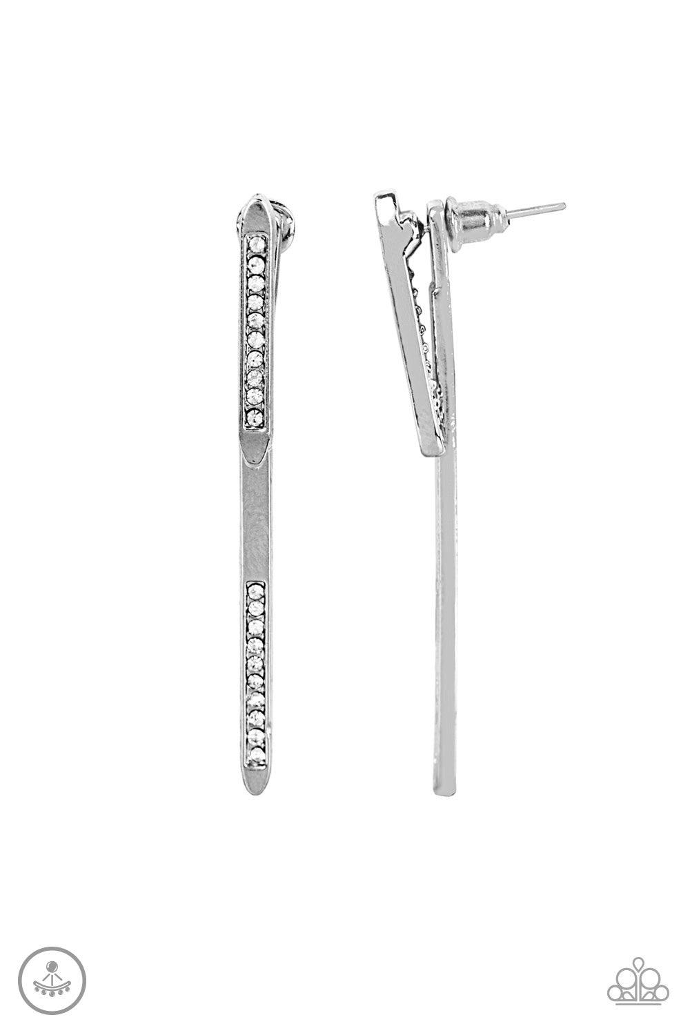Paparazzi Accessories Very Important VIXEN - White Encrusted in glassy white rhinestones, a dainty silver rod attaches to a double-sided post, designed to fasten behind the ear. As if dipped in white rhinestones, a larger silver rod peeks out beneath the