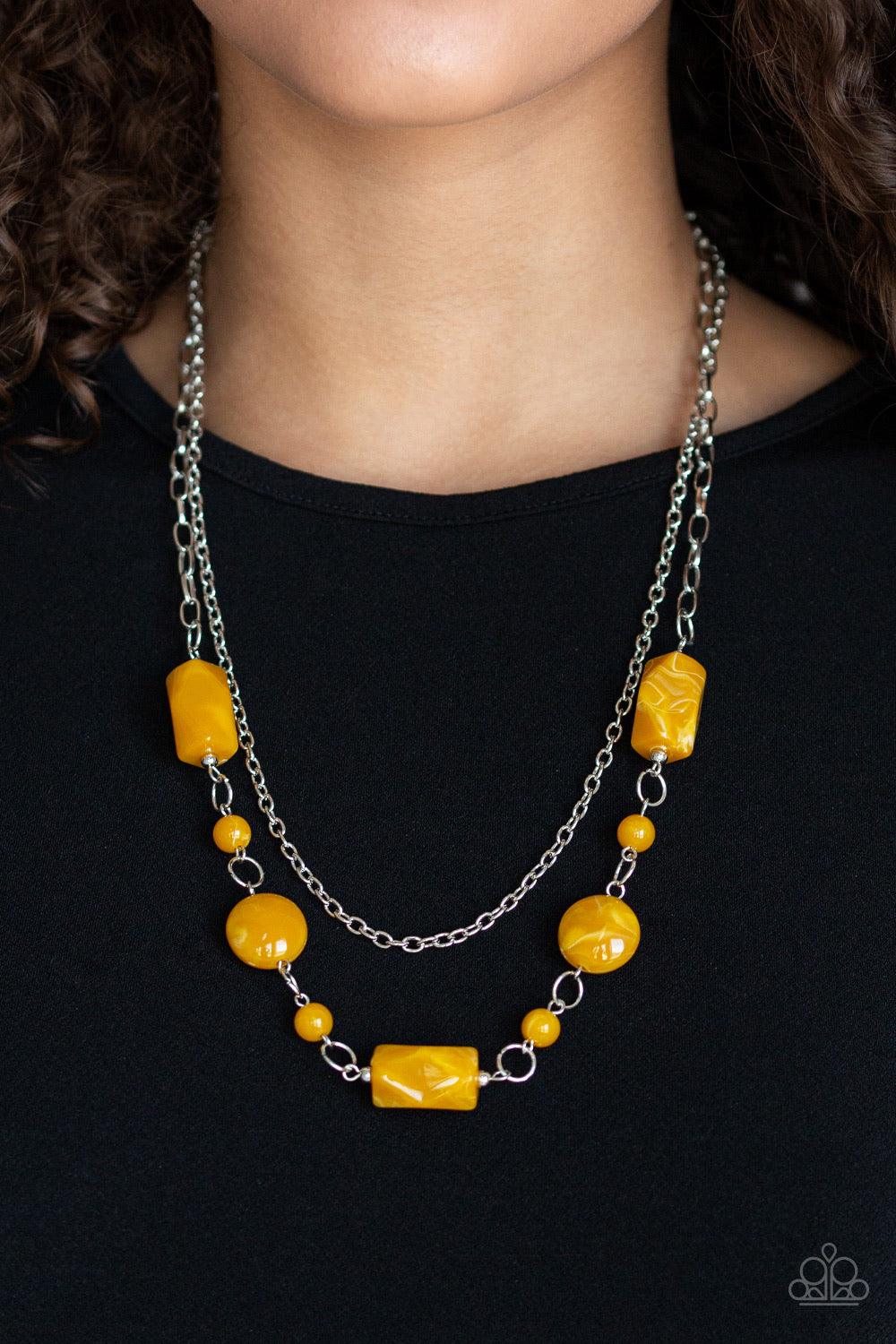 Paparazzi Accessories Colorfully Cosmopolitan - Yellow Infused with a plain silver chain, a collection of round and faceted yellow acrylic beads link below the collar for a whimsically colorful finish. Features an adjustable clasp closure. Jewelry
