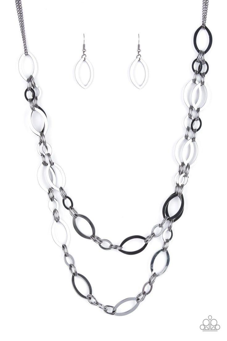 Paparazzi Accessories The OVAL-achiever - Black Stunning gunmetal ellipses link together for two layers of bold, basic drama. The layers hang from a simple gunmetal chain adding balance to the scene. Features an adjustable clasp closure. Sold as one indiv
