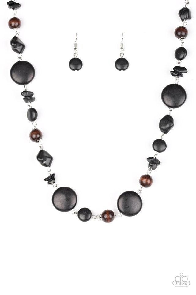Paparazzi Accessories Canyon Collection ~Black Chiseled into round and earthy pebble cuts, black stones link below the collar in a seasonal fashion. Shiny wooden beads are sprinkled between the earthy stone accents for a handcrafted, artisan inspired fini