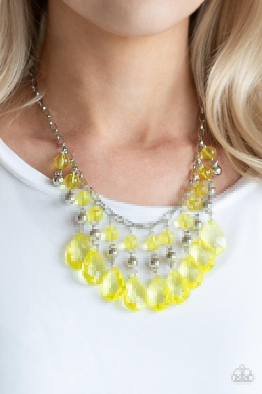 Paparazzi Accessories Beauty School Drop Out - Yellow Faceted crystal-like teardrops in a gorgeous yellow hue dance along the neckline with shiny silver beads and smaller yellow crystal-like beads creating a dramatic flair. Features an adjustable clasp cl