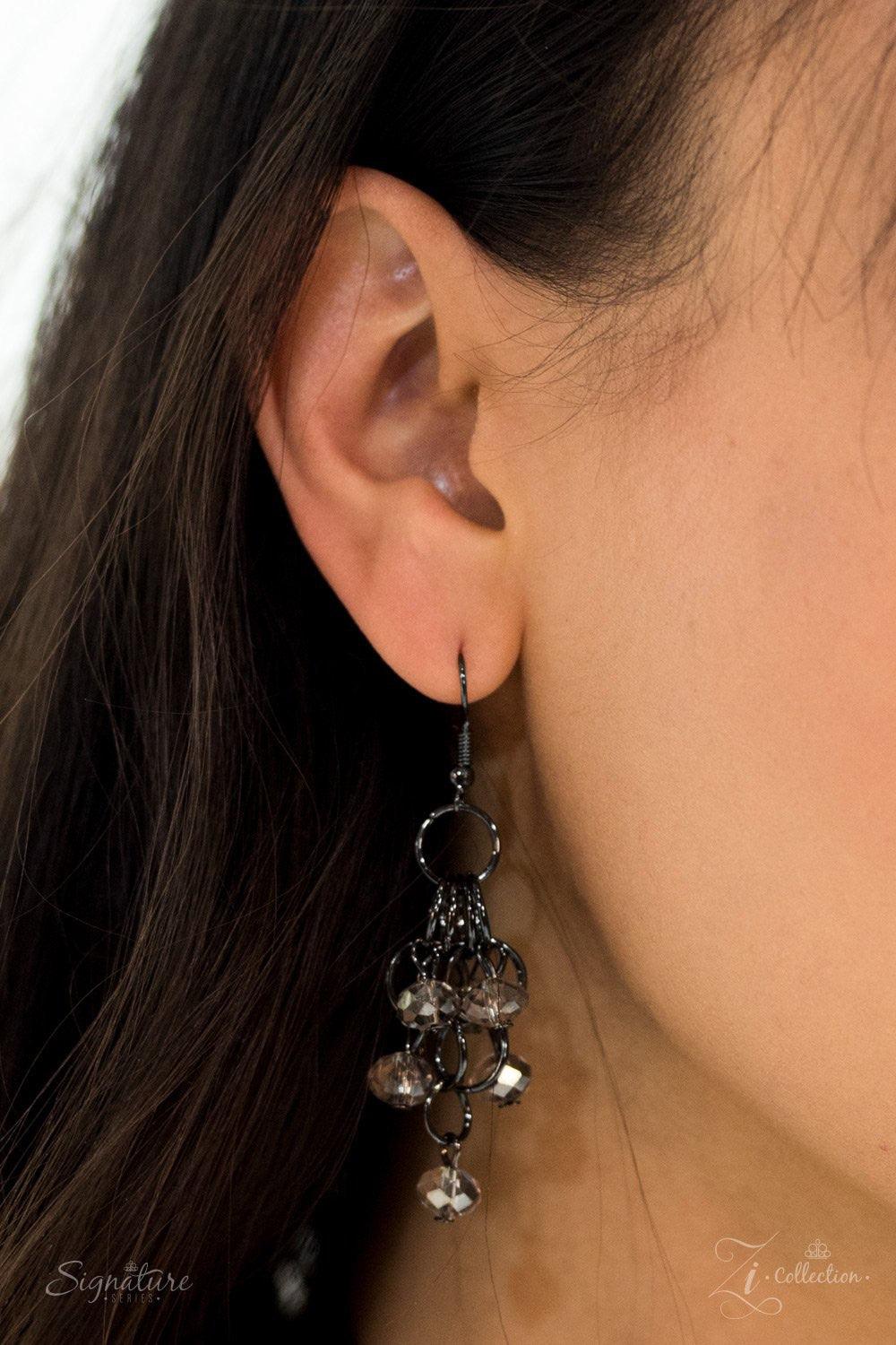 Paparazzi Accessories The Nina Interlocking gunmetal links join into a tapered mesh down the chest. Featuring a sparkling faceted surface, glittery crystal-like beading swings from the top and bottom of the fierce palette for a hypnotizing finish. Feature