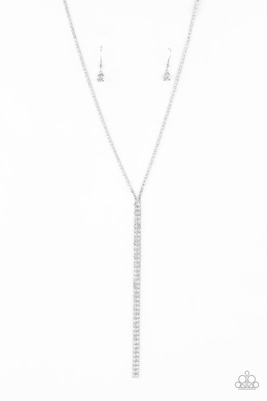 Paparazzi Accessories Inner STARLIGHT - White Featuring square silver fittings, a dainty strand of glassy white rhinestones drapes around the neck. The glittery strands delicately connect, splitting off into two twinkling tassels down the chest. Features