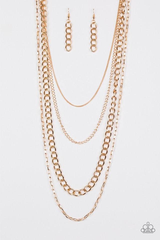 Paparazzi Accessories Metro Metal - Gold A mishmash of gold chains drape across the chest for a collision of edgy textures. Features an adjustable clasp closure. Sold as one individual necklace. Includes one pair of matching earrings. Jewelry