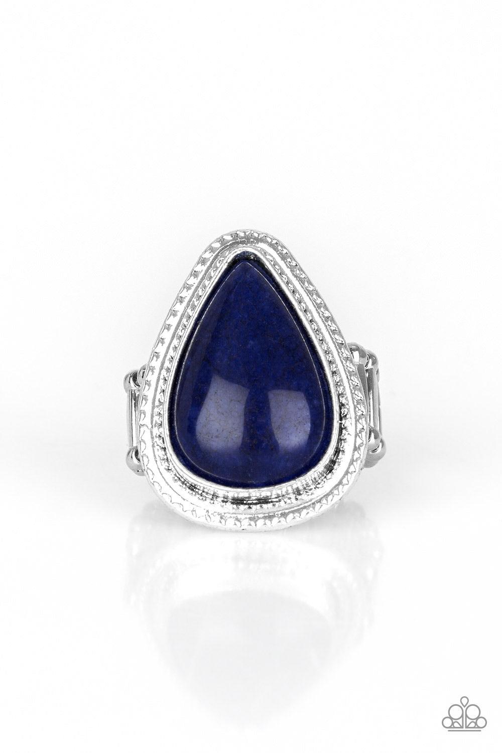 Paparazzi Accessories Mojave Mist - Blue Chiseled into a tranquil teardrop, a depthless blue stone is pressed into a textured silver teardrop frame for a seasonal look. As the stone elements in this piece are natural, some color variation is normal. Featu