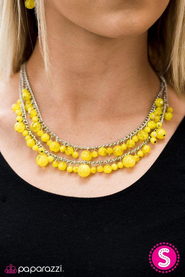 Paparazzi Accessories Summer Isles - Yellow Glassy Yellow beading trickles along two shimmery silver chains, creating colorful layers below the collar. Featuring a variety of opacity and size, the gorgeous beading falls into a summery inspired fashion. Fe