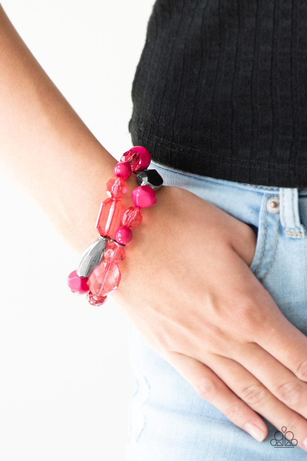 Paparazzi Accessories Rockin Rock Candy - Pink Mismatched gunmetal, polished pink, and crystal-like beads are threaded along interlocking stretchy bands for a whimsical look. Sold as one individual bracelet. Jewelry