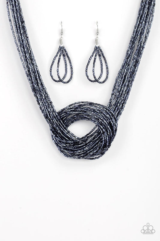 Paparazzi Accessories Knotted Knockout - Blue Countless strands of metallic blue seed beads delicately knot together below the collar to create an unforgettable statement piece. Features an adjustable clasp closure. Jewelry