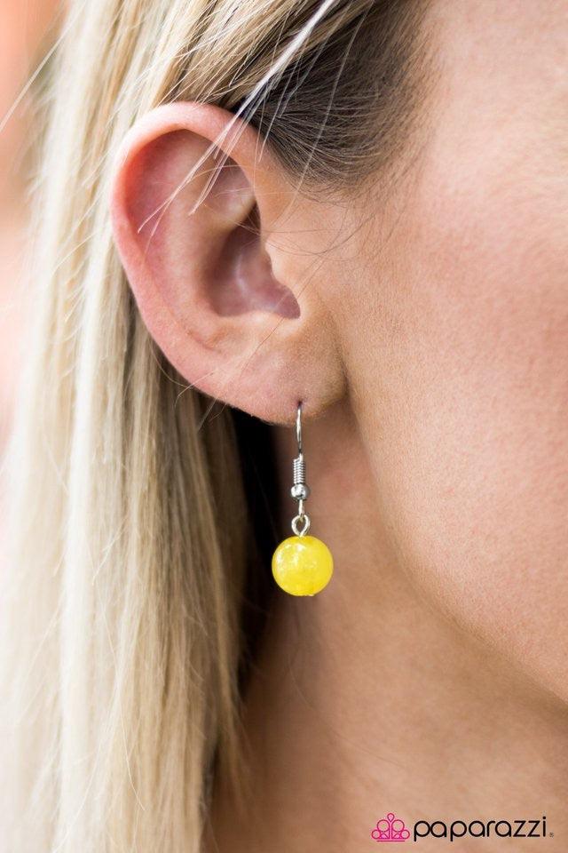 Paparazzi Accessories Summer Isles - Yellow Glassy Yellow beading trickles along two shimmery silver chains, creating colorful layers below the collar. Featuring a variety of opacity and size, the gorgeous beading falls into a summery inspired fashion. Fe