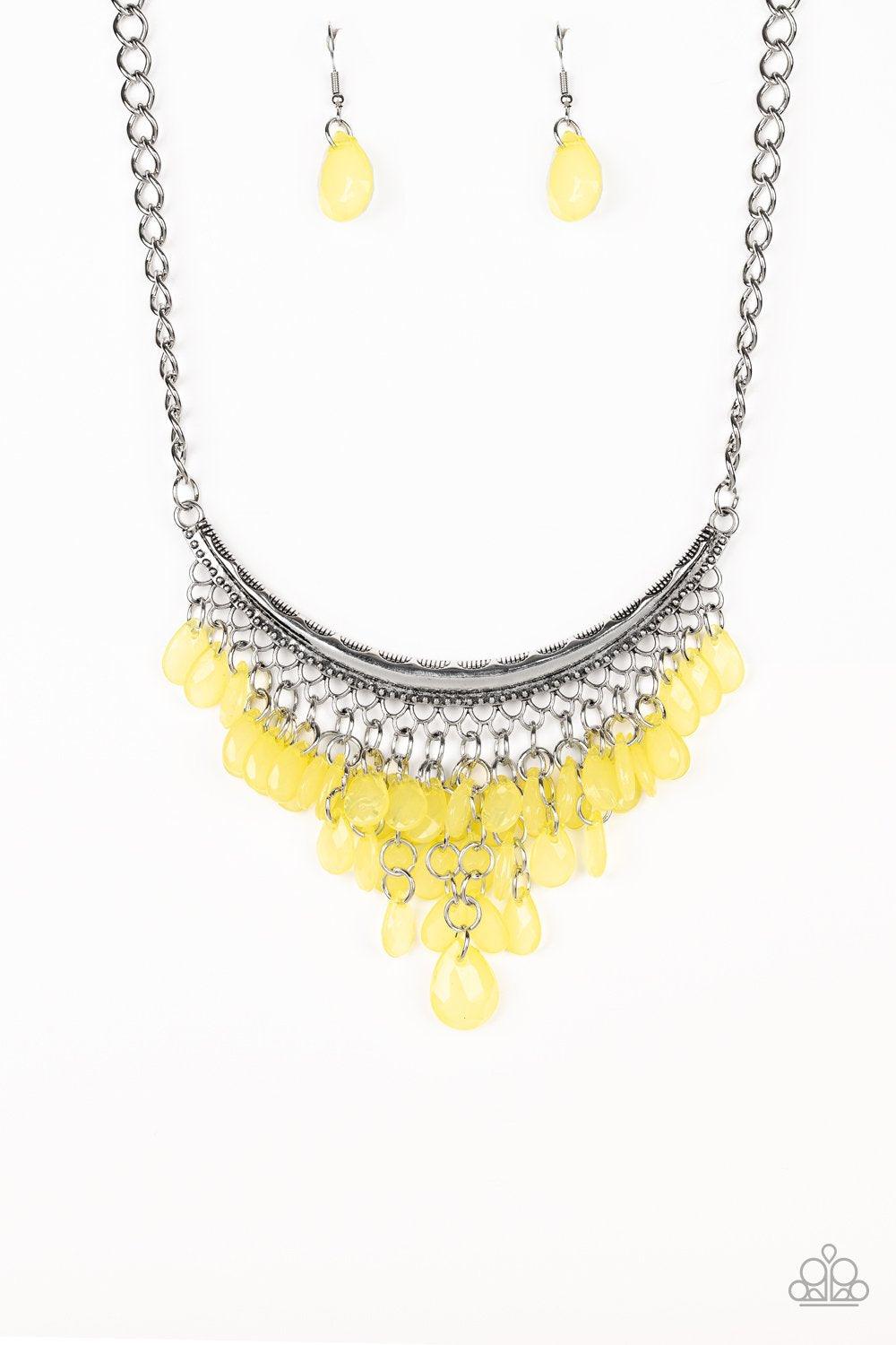 Paparazzi Accessories Rio Rainfall - Yellow Varying in size, opaque yellow teardrops drip from the bottom of a bowing silver bar, creating an effervescent fringe below the collar. Features an adjustable clasp closure. Sold as one individual necklace. Incl
