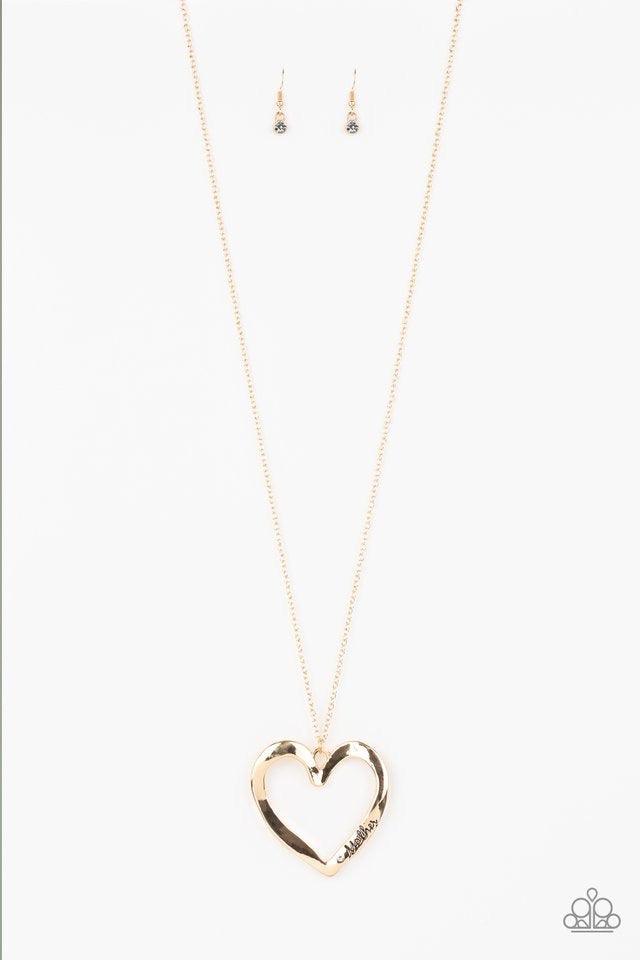 Paparazzi Accessories A Mother’s Love - Gold Swinging from the bottom of a lengthened gold chain, an asymmetrical heart pendant is stamped in the word, "mom" and dotted with a single white rhinestone for a whimsical look. Features an adjustable clasp clos