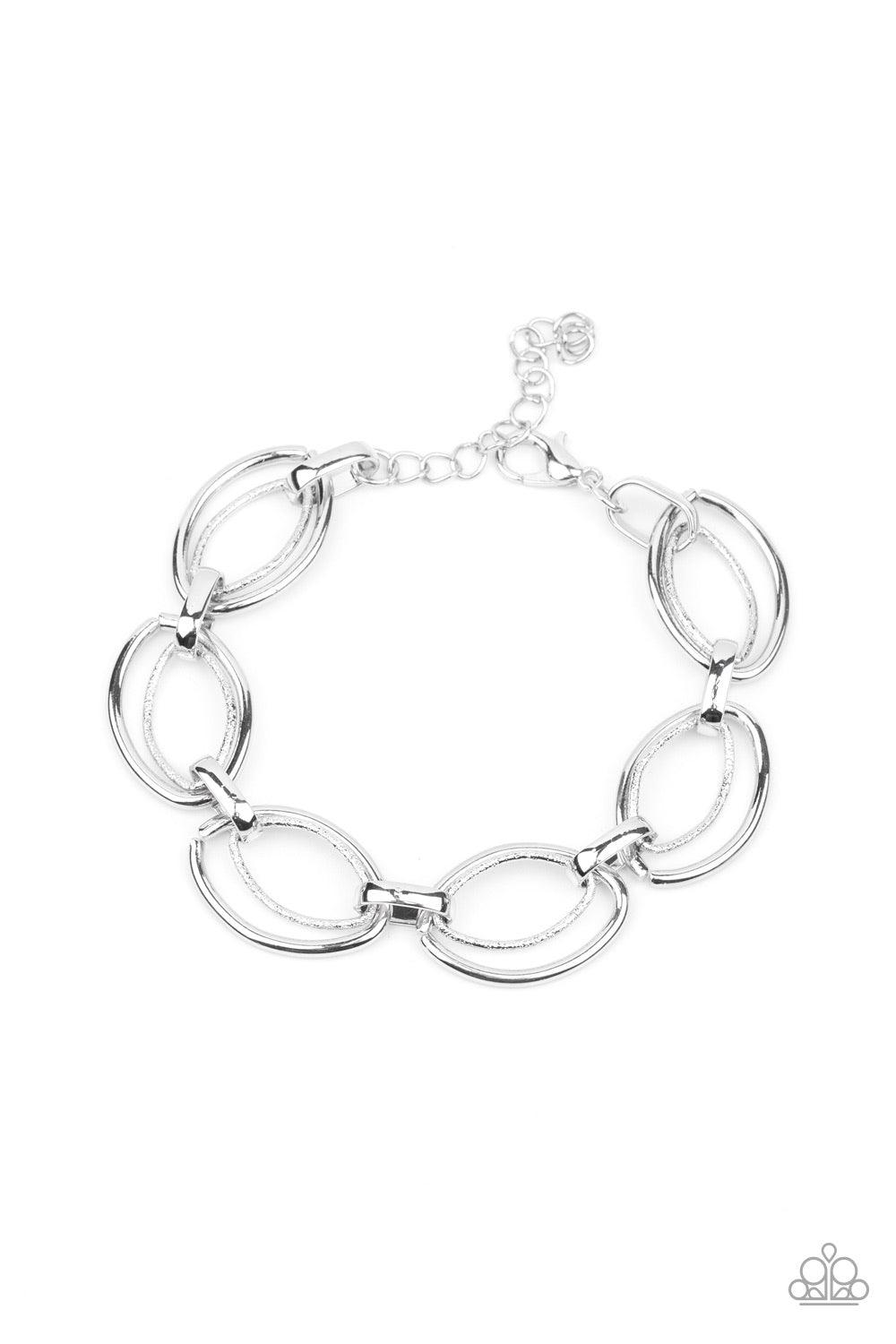 Paparazzi Accessories Simplistic Shimmer - Silver Smooth and hammered silver oval-like links delicately connect across the wrist for an edgy, industrial display. Features an adjustable clasp closure. Sold as one individual bracelet. Jewelry