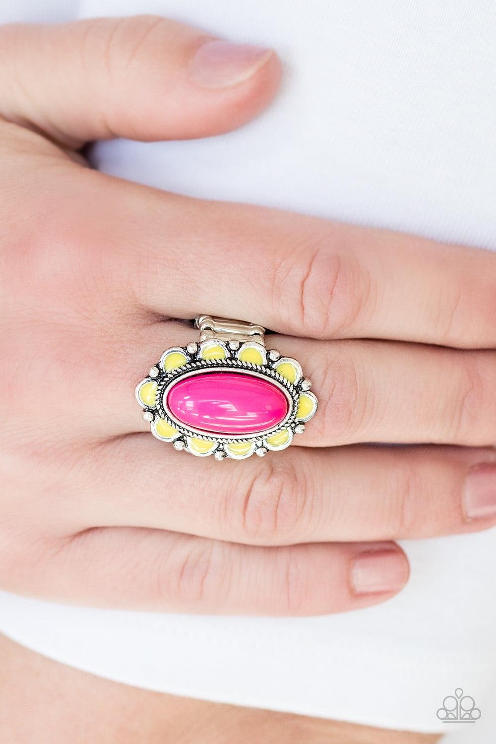 Paparazzi Accessories Beach Bloom - Pink Vibrant yellow petals spin around a vivacious pink beaded center, creating a summery flower atop the finger. Features a stretchy band for a flexible fit. Jewelry