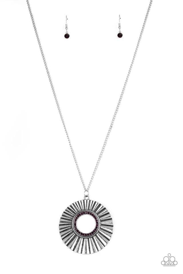 Paparazzi Accessories Chicly Centered - Purple Brushed in a gritty antiqued finish, a rippling silver frame flares from a purple rhinestone encrusted center for an edgy look. Features an adjustable clasp closure. Jewelry