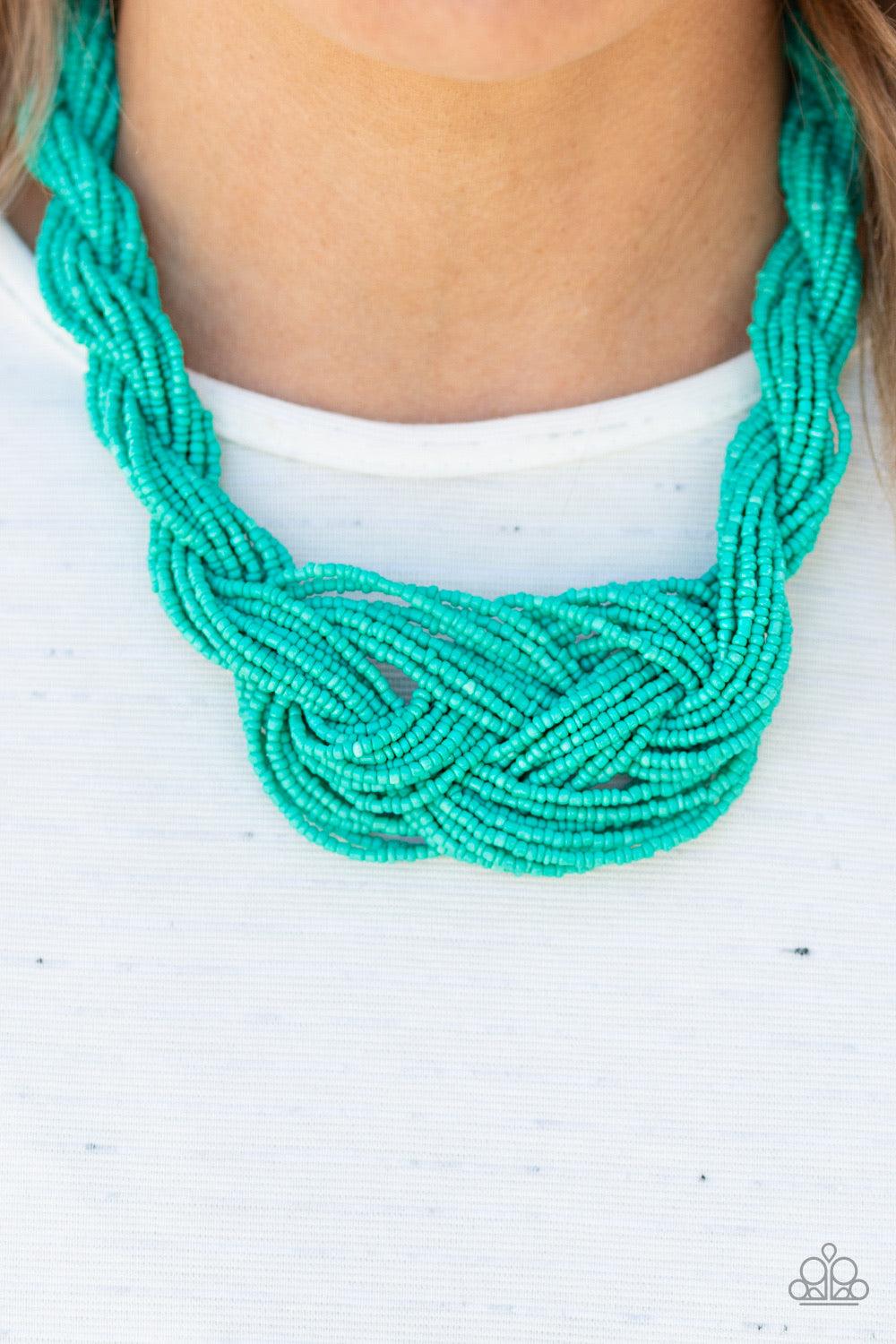 Paparazzi Accessories A Standing Ovation - Blue Countless strands of turquoise seed beads are twisted and knotted together to create an unforgettable statement piece. Features an adjustable clasp closure. Sold as one individual necklace. Includes one pair