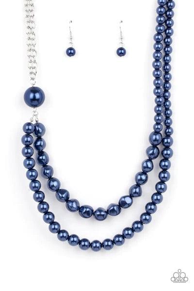 Paparazzi Accessories Remarkable Radiance - Blue A dramatically oversized blue pearl gives way to two mismatched strands of classic blue pearls that graduate in size and imperfect finishes, adding a timeless twist to the classic pearl palette. Features an
