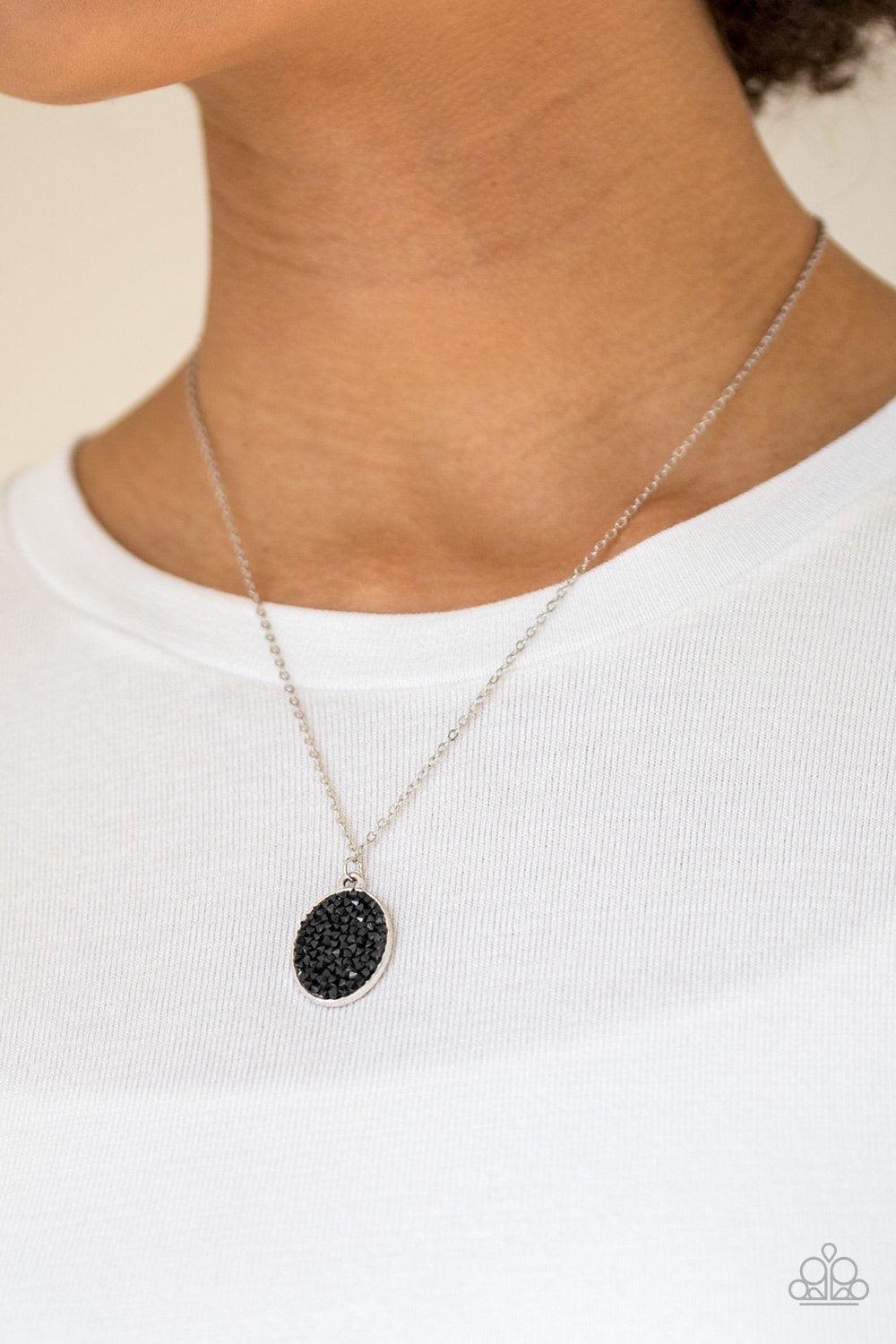 Paparazzi Accessories Star-Crossed Stargazer - Black Glittery black rhinestones are sprinkled along an oval silver frame, creating a stellar pendant below the collar. Features an adjustable clasp closure. Jewelry