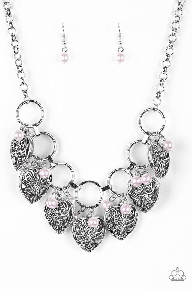 Paparazzi Accessories Very Valentine ~Pink Infused with classic pink pearls, vintage locket-like heart frames swing from the bottoms of bold silver hoops, creating a flirtatious fringe below the collar. Features an adjustable clasp closure. Sold as one in