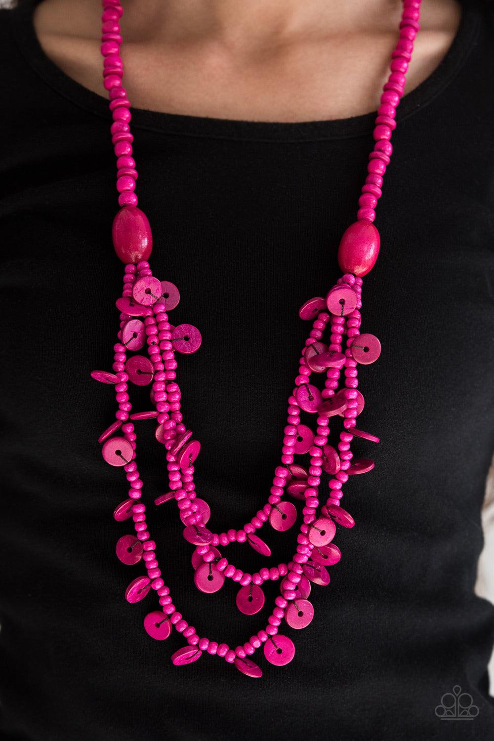 Paparazzi Accessories Safari Samba - Pink Brushed in a vivacious pink finish, two bold wooden beads give way to summery layers. Brushed in a distressed finish, dainty wooden discs swing from the bottom of the layers for a flirty finish. Sold as one indivi