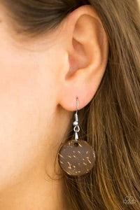 Paparazzi Accessories Bahama Bungalow - Purple Brushed in a distressed finish, wooden discs link into three summery rows below the collar. Round purple beads are knotted between the wooden accents, adding colorful accents to the seasonal palette. Features