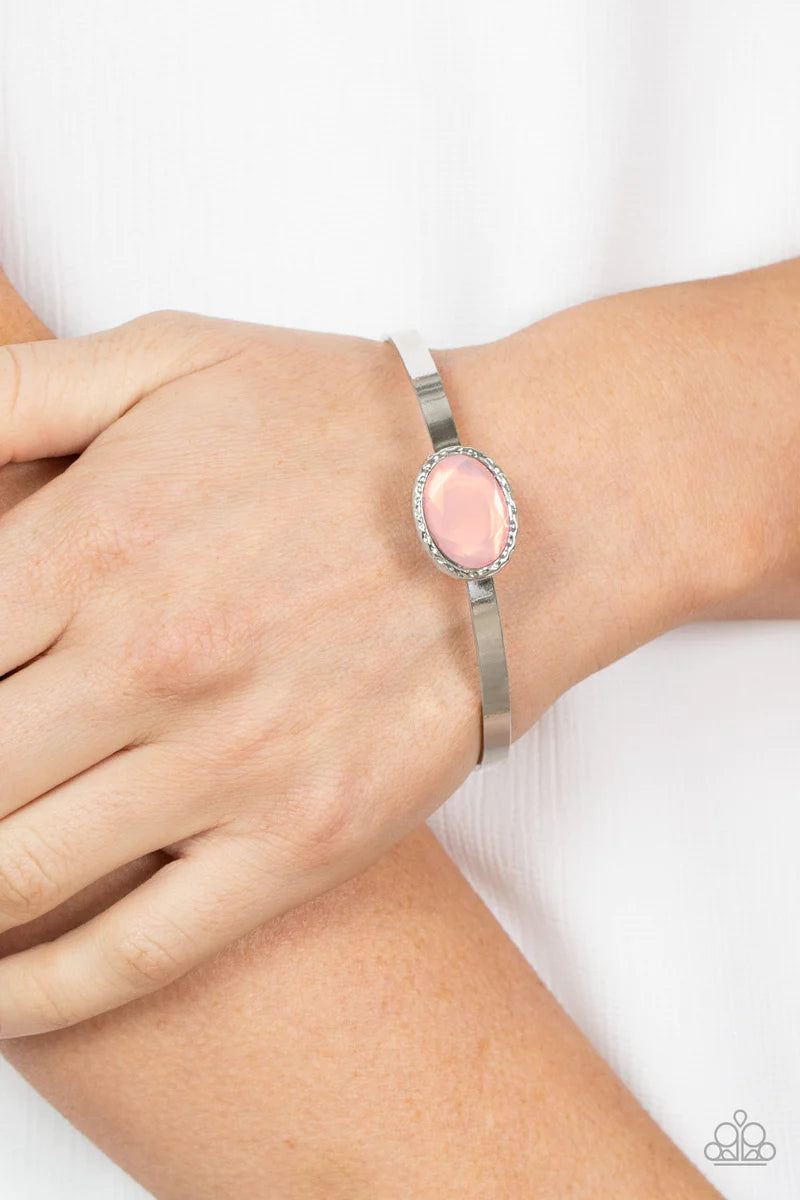 Paparazzi Accessories Misty Meadow - Pink A misty Pale Rosette gem is pressed into the center of a hammered silver fitting atop a thick silver bangle, creating an ethereal centerpiece. Sold as one individual bracelet. Bracelets