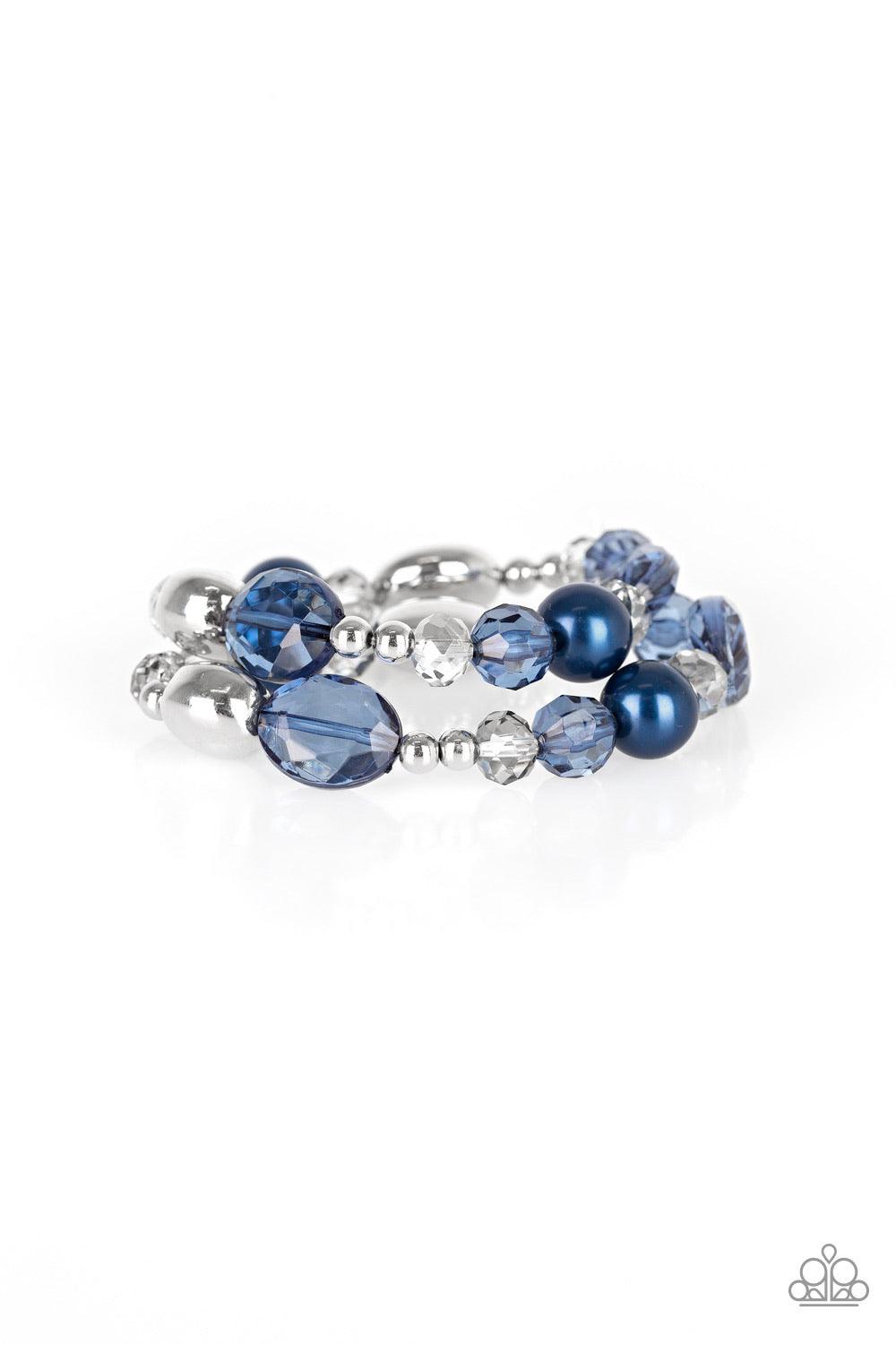 Paparazzi Accessories Downtown Dazzle - Blue An array of blue pearls, shiny silver beads, and metallic crystal-like beads are threaded along stretchy bands around the wrist for a refined look. Sold as one set of two bracelets. Jewelry