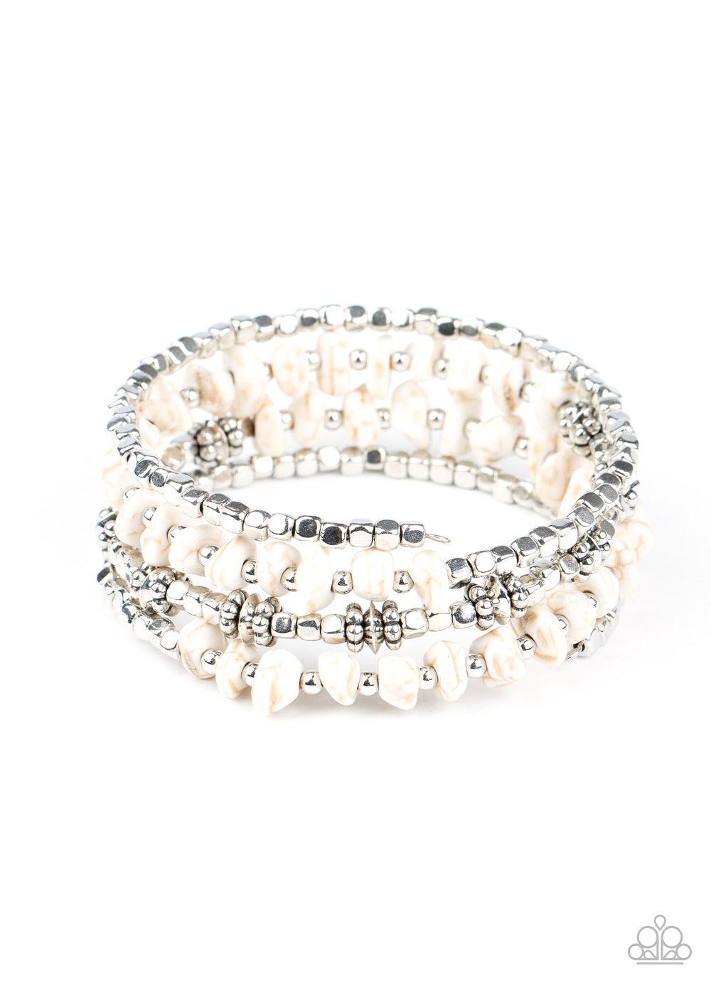 Paparazzi Accessories Rockin Renegade - White An earthy collision of white stone beads, silver cubes, and decorative silver accents are threaded along a silver wire that coils around the wrist, creating a whimsical infinity wrap bracelet. Sold as one indi
