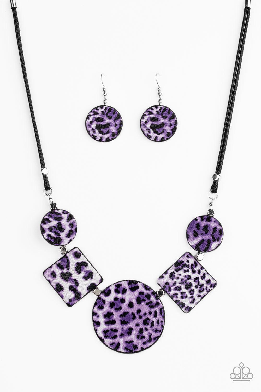 Paparazzi Accessories Here Kitty Kitty - Purple Featuring textured purple cheetah print, a wild collection of circle and square leather pieces are threaded along an invisible wire below the look for a fierce look. Features an adjustable clasp closure. Sol
