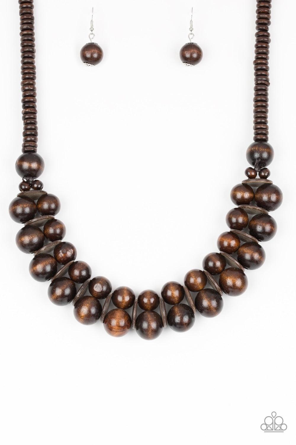 Paparazzi Accessories Caribbean Cover Girl - Brown Brushed in a distressed finish, earthy brown wooden beads and discs join below the collar for a summery look. Features a button loop closure. Jewelry