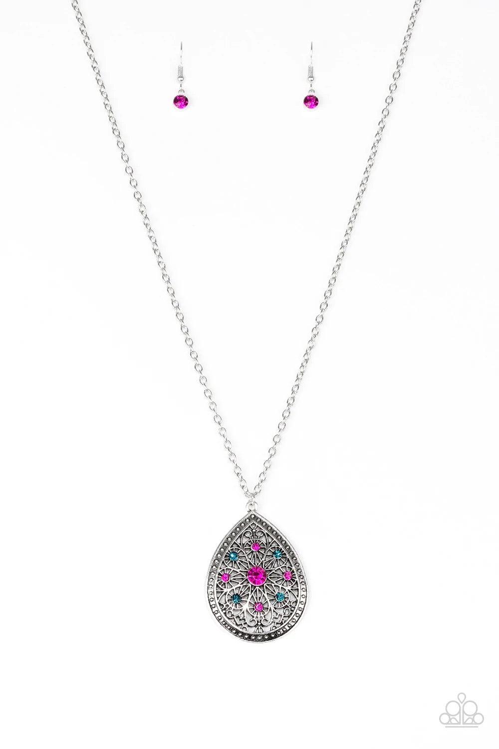 Paparazzi Accessories I Am Queen - Multi A dramatic teardrop pendant swings from the bottom of an elongated silver chain, elegantly slimming the torso. Glittery blue and pink rhinestones are sprinkled along the pendant as silver filigree dances across the