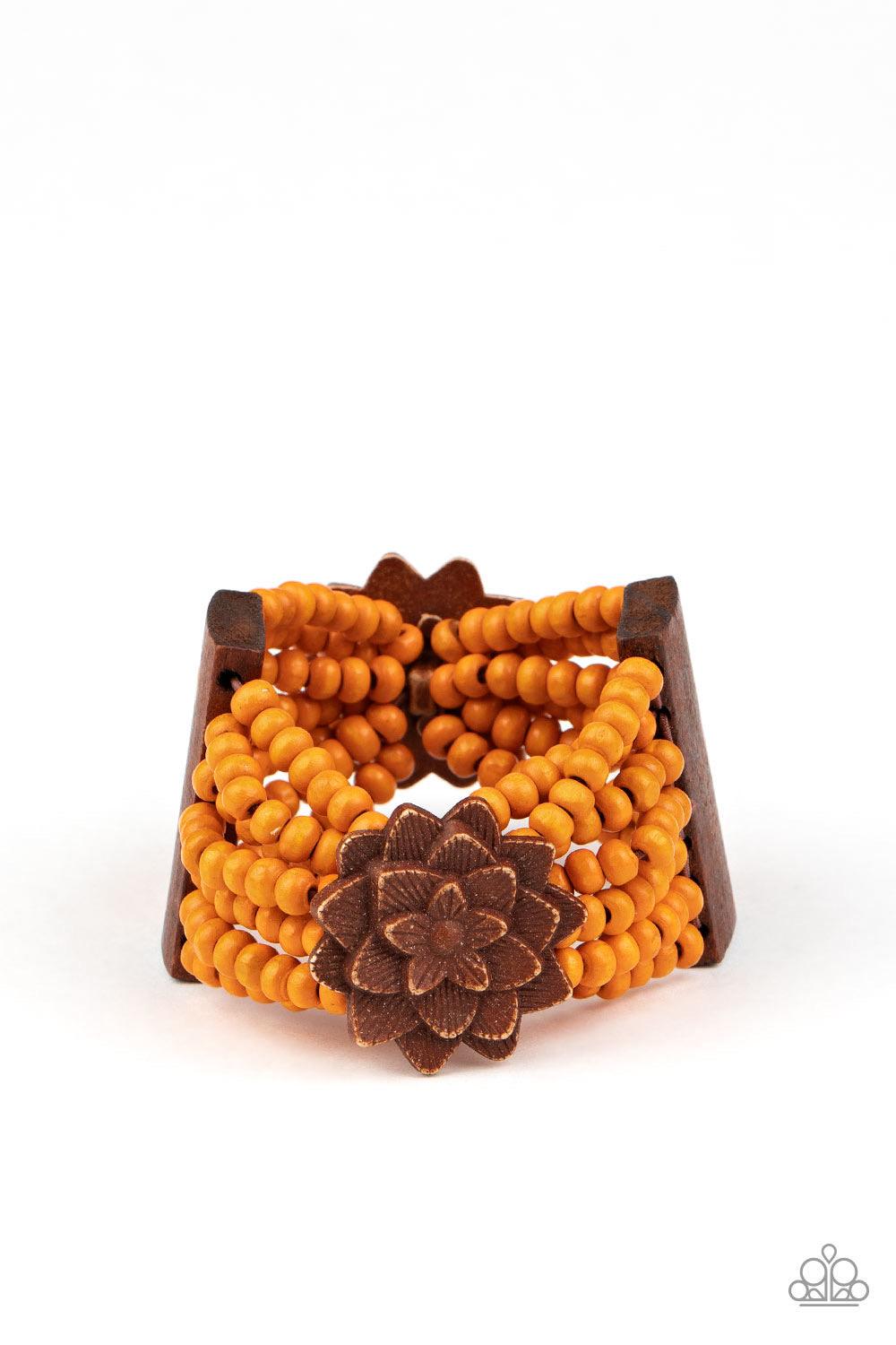 Paparazzi Accessories Tropical Sanctuary ~Orange Held together by oversized rectangular fittings and wooden floral frames, strands of refreshing orange wooden beads are threaded along stretchy bands that weave around the wrist for a colorful island inspir