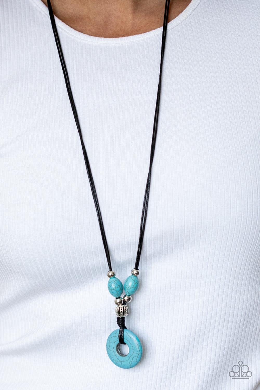 Paparazzi Accessories Middle Earth - Blue A refreshing turquoise stone disc is knotted in place at the bottom of shiny black cording decorated in matching turquoise stone and ornate silver beads, creating an earthy display below the collar. Features an ad