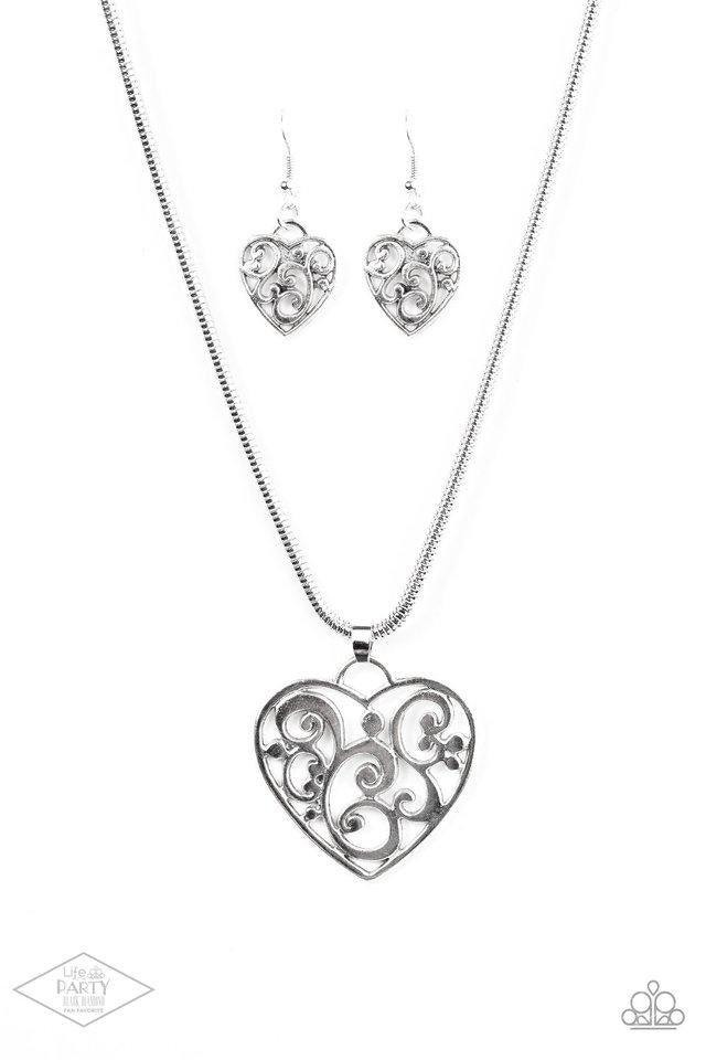 Paparazzi Accessories FILIGREE Your Heart With Love - Silver An airy heart swings from the bottom of shimmery silver cocoon chain, creating a whimsical pendant below the collar. Brushed in an antiqued shimmer, frilly filigree climbs the heart frame for a